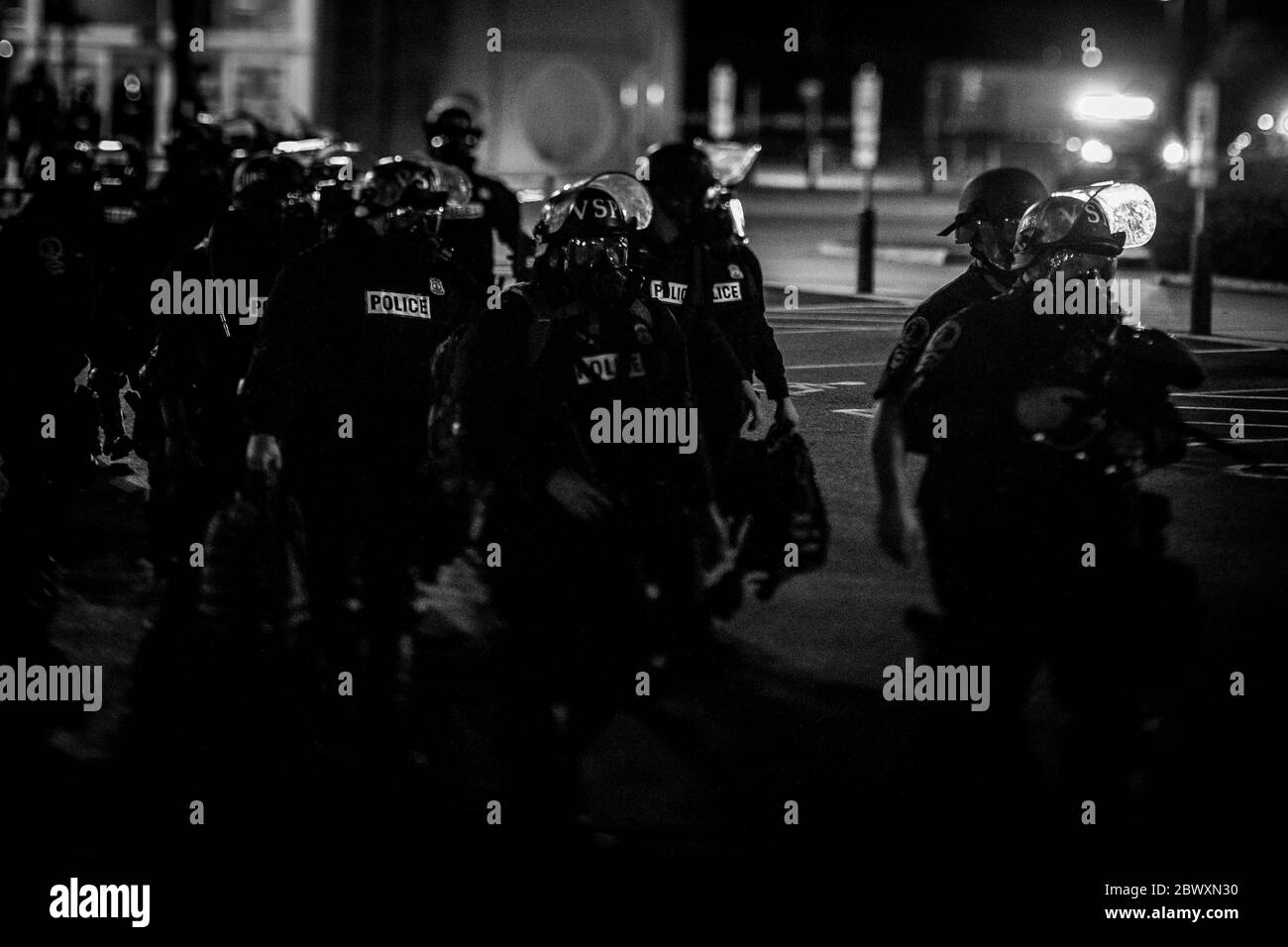 Hampton, Virginia, USA. 2nd June, 2020. Virginia State Police move in to join the combined police line near Target during the protest at the Peninsula Town Center on Tuesday June 2, 2020 in Richmond, VA. According to police, the protest was deemed an unlawful assembly after a smoke bomb was thrown and gunshots were heard from the crowd. Credit: John C. Clark/ZUMA Wire/Alamy Live News Stock Photo