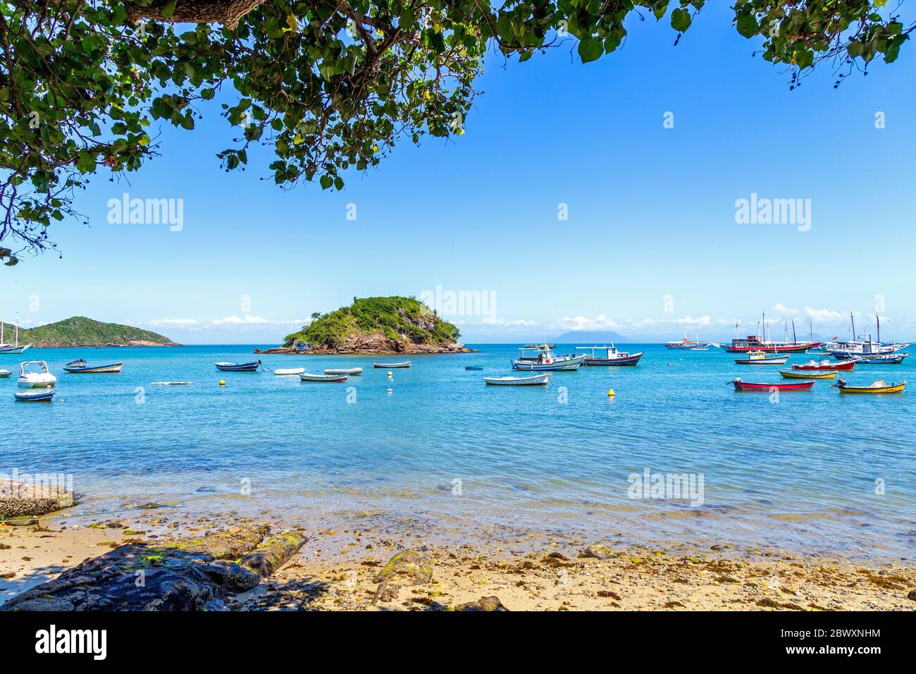 Buzios, Brazil. Seascape of Armacao Beach in Buzios, Rio de Janeiro, Brazil. Panoramic view of the bay. Boats and sailboats anchored in the sea. Stock Photo