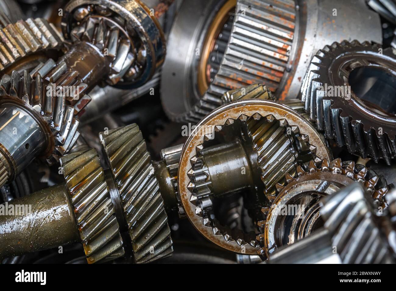 used transmission gearbox part at junkyard or scrapyard for recycling with selective fucus Stock Photo