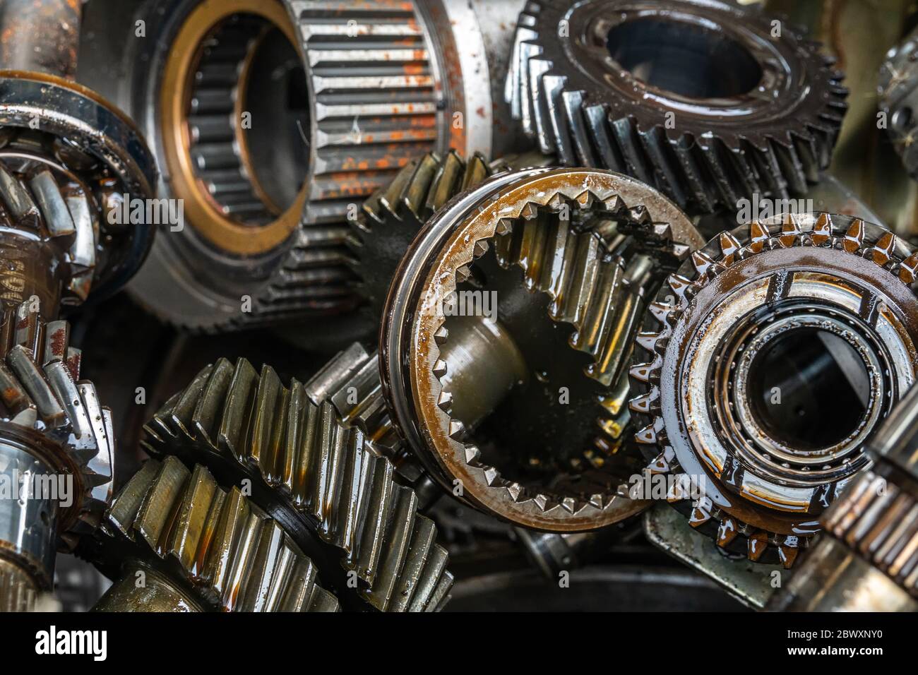 gearbox of an open engine with sprockets, shafts, gearwheels, transmission  of a combustion engine, car parts, mechanics - a Royalty Free Stock Photo  from Photocase