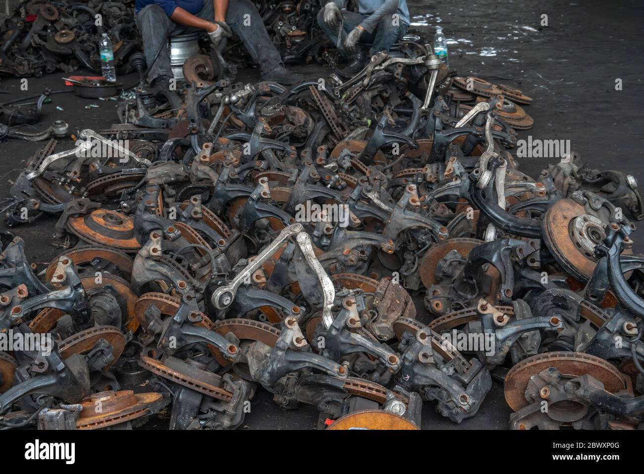 used brake rotor and car part at junkyard or scrapyard for recycling