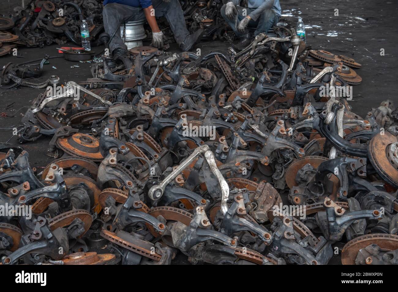 used brake rotor and car part at junkyard or scrapyard for recycling