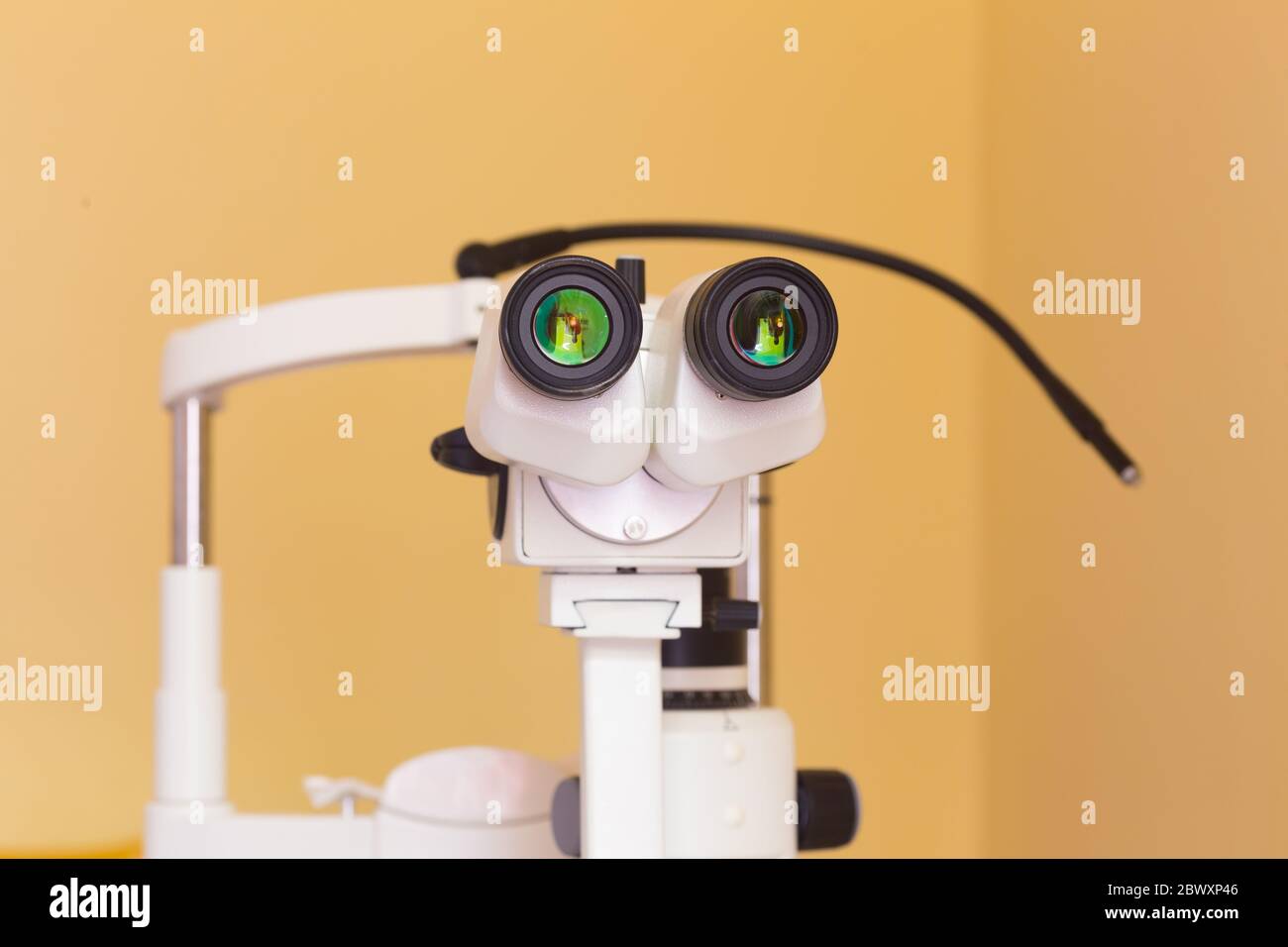 Ophthalmology device on wall background Stock Photo - Alamy