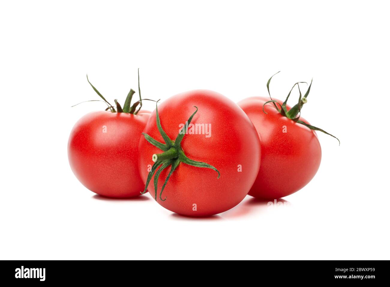 Fresh ripe tomatoes isolated on white background Stock Photo - Alamy