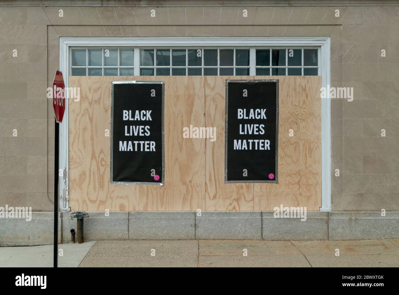 Businesses boarded up in anticipation of violence at a Black Lives Matter march in Quincy, Massachusetts, after police murder of George Floyd. Stock Photo