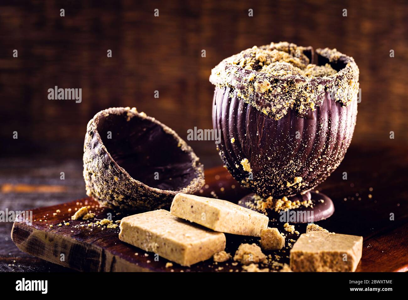 homemade easter egg, easter from brazil. Chocolate with paçoca, Brazilian ingredient made from ground peanuts. Stock Photo