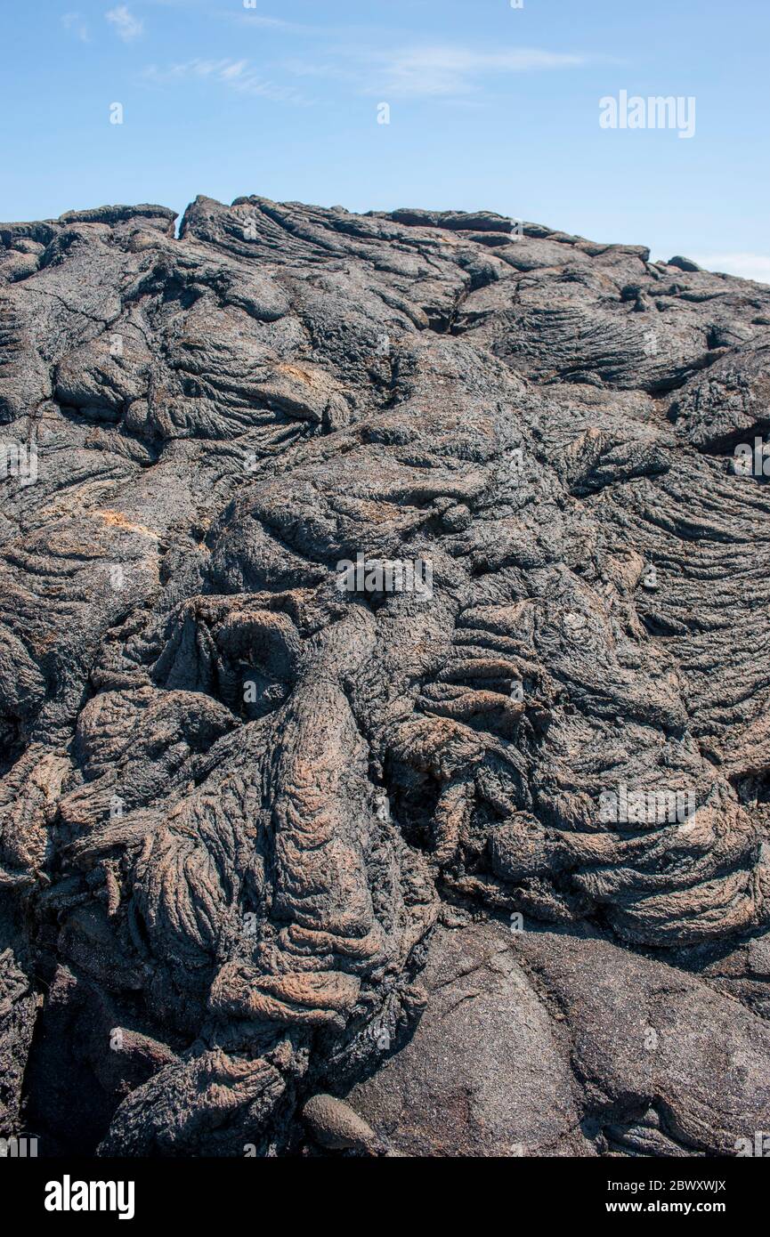 Pahoehoe lava, also called rope lava, on Fernandina Island in the Galapagos Islands, Ecuador. Stock Photo