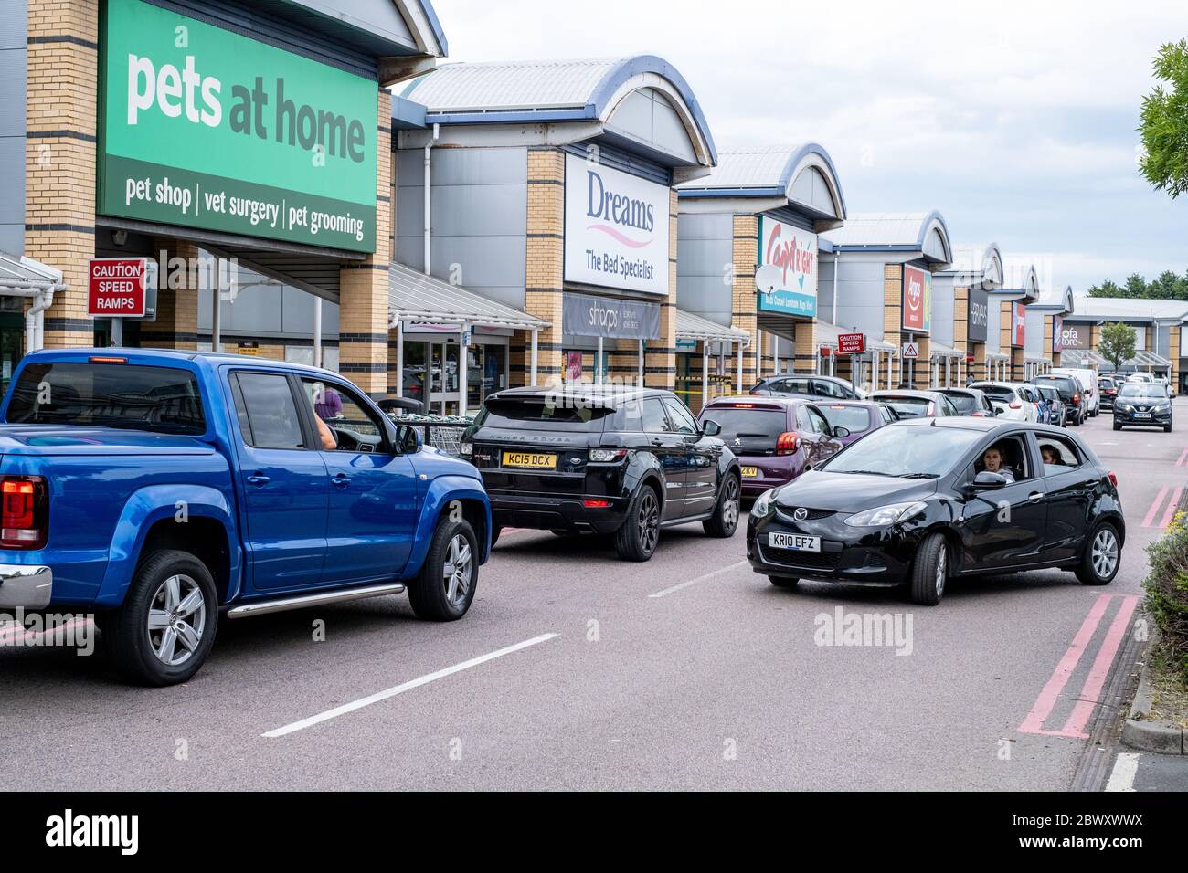 Long queues for retail shopping & McDonalds for 90 minutes to get parked & served at Airport Retail Park, Southend, after  restrictions are lifted Stock Photo