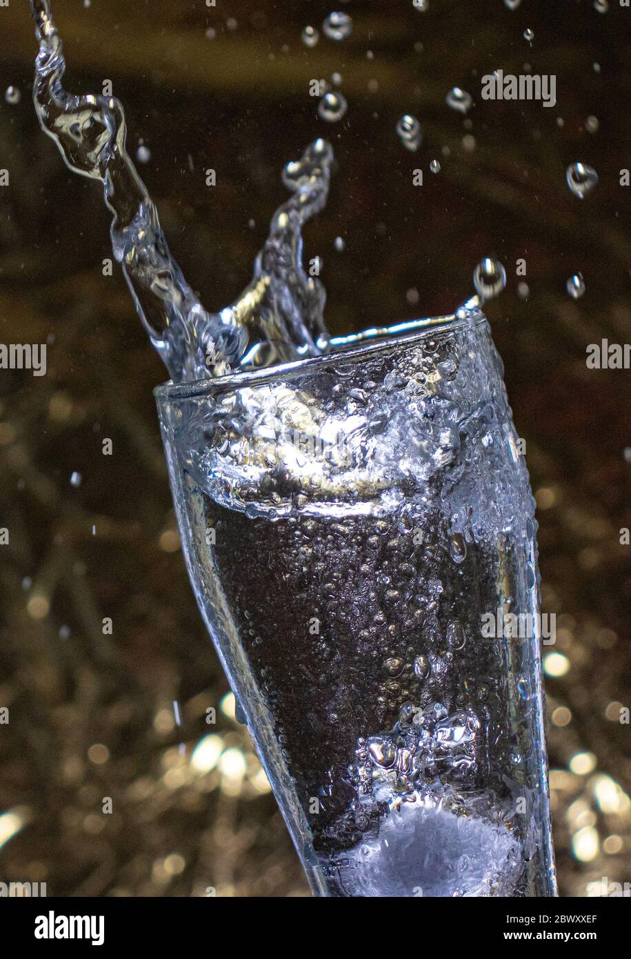 Small and big ice cube with water drops Stock Photo - Alamy