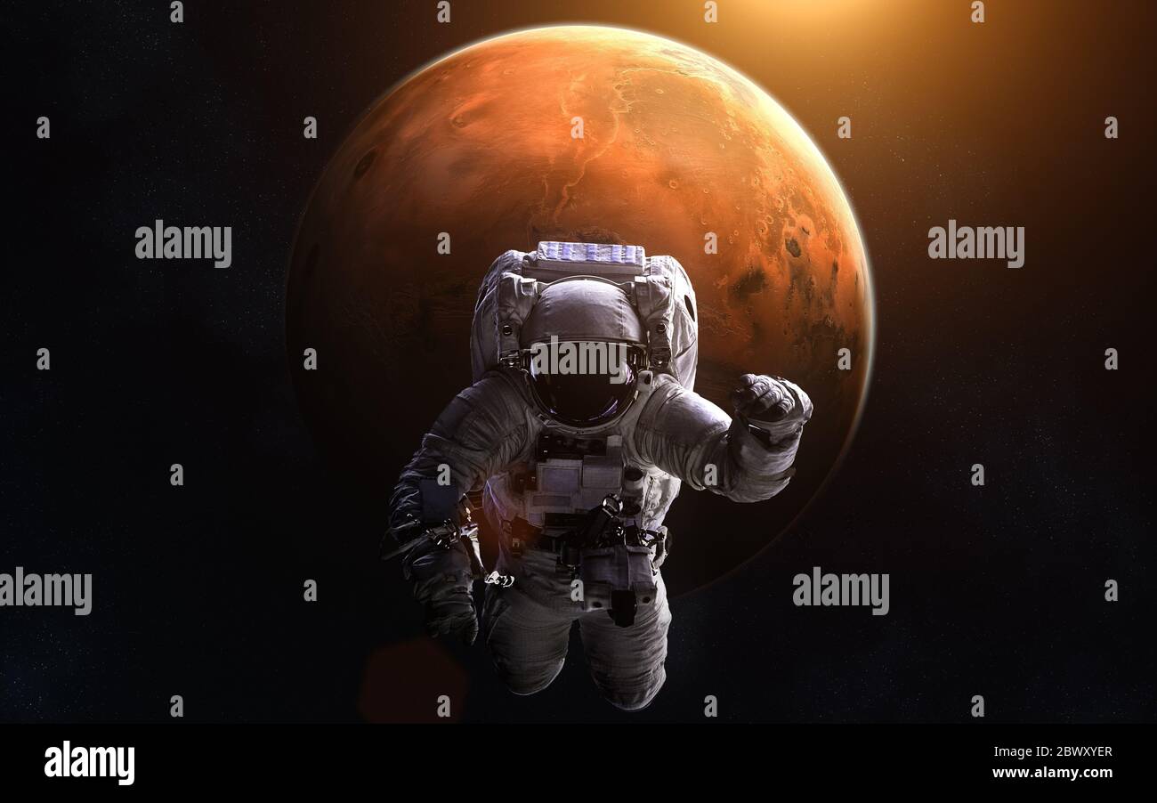 Astronaut on background of Mars Stock Photo
