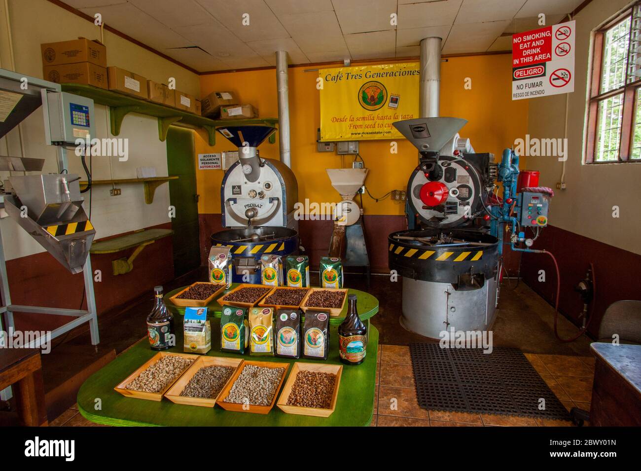 A coffee roaster and coffee samples at the Doka Estate coffee
