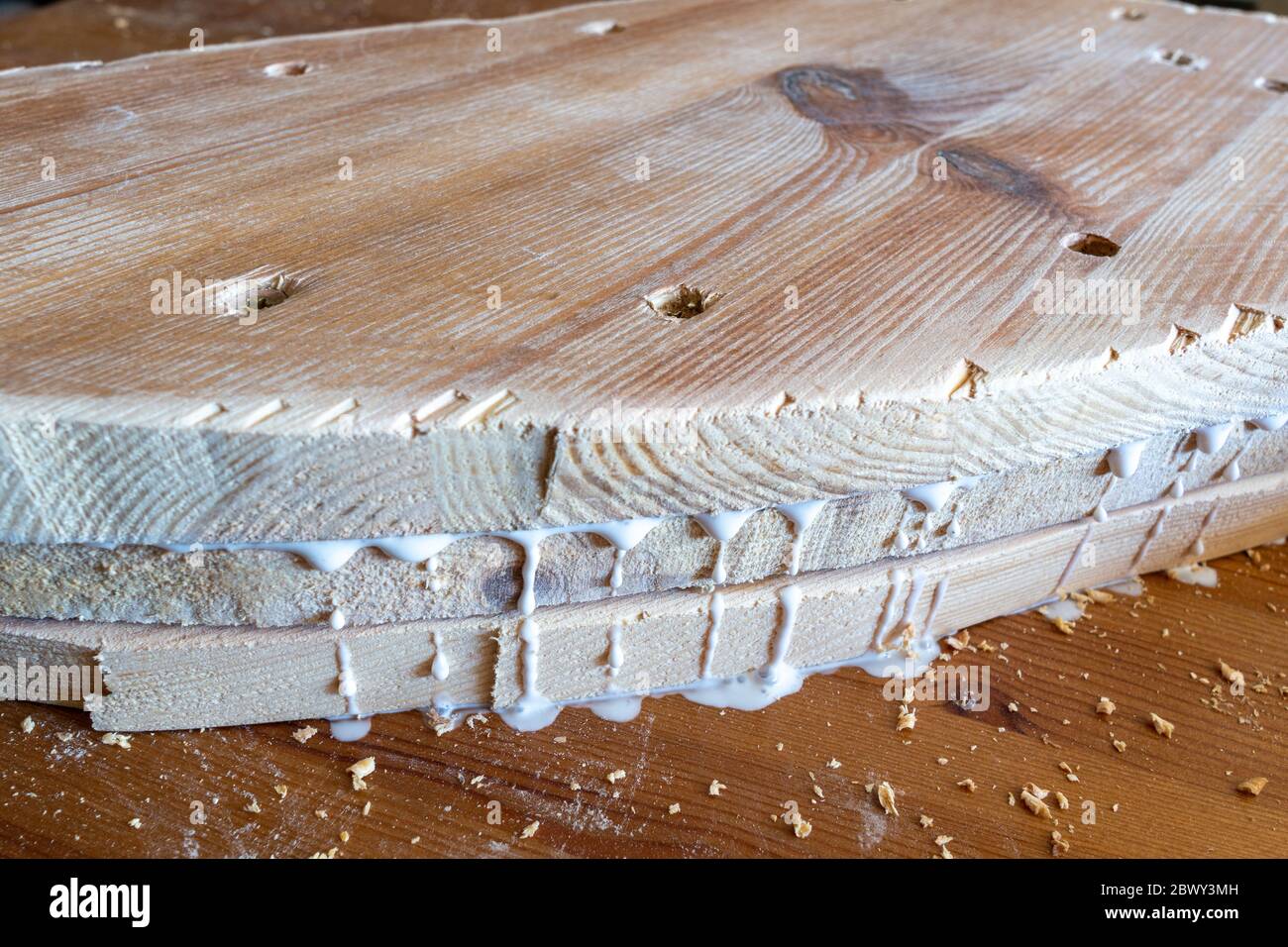 Using Glue To Connect Wooden boards For Furniture Detail Stock Photo