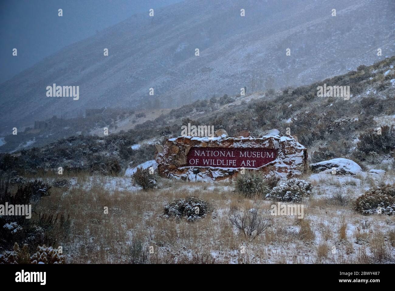 Snow falling at the  National Museum of Wildlife Art located on a butte overlooking the National Elk Refuge in Jackson Wyoming Stock Photo