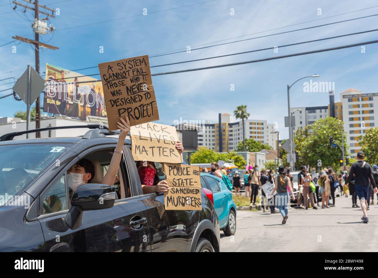 Protesters in their cars at Black Lives Matter protest over the killing of George Floyd: Fairfax District, Los Angeles, CA, USA - May 30, 2020 Stock Photo