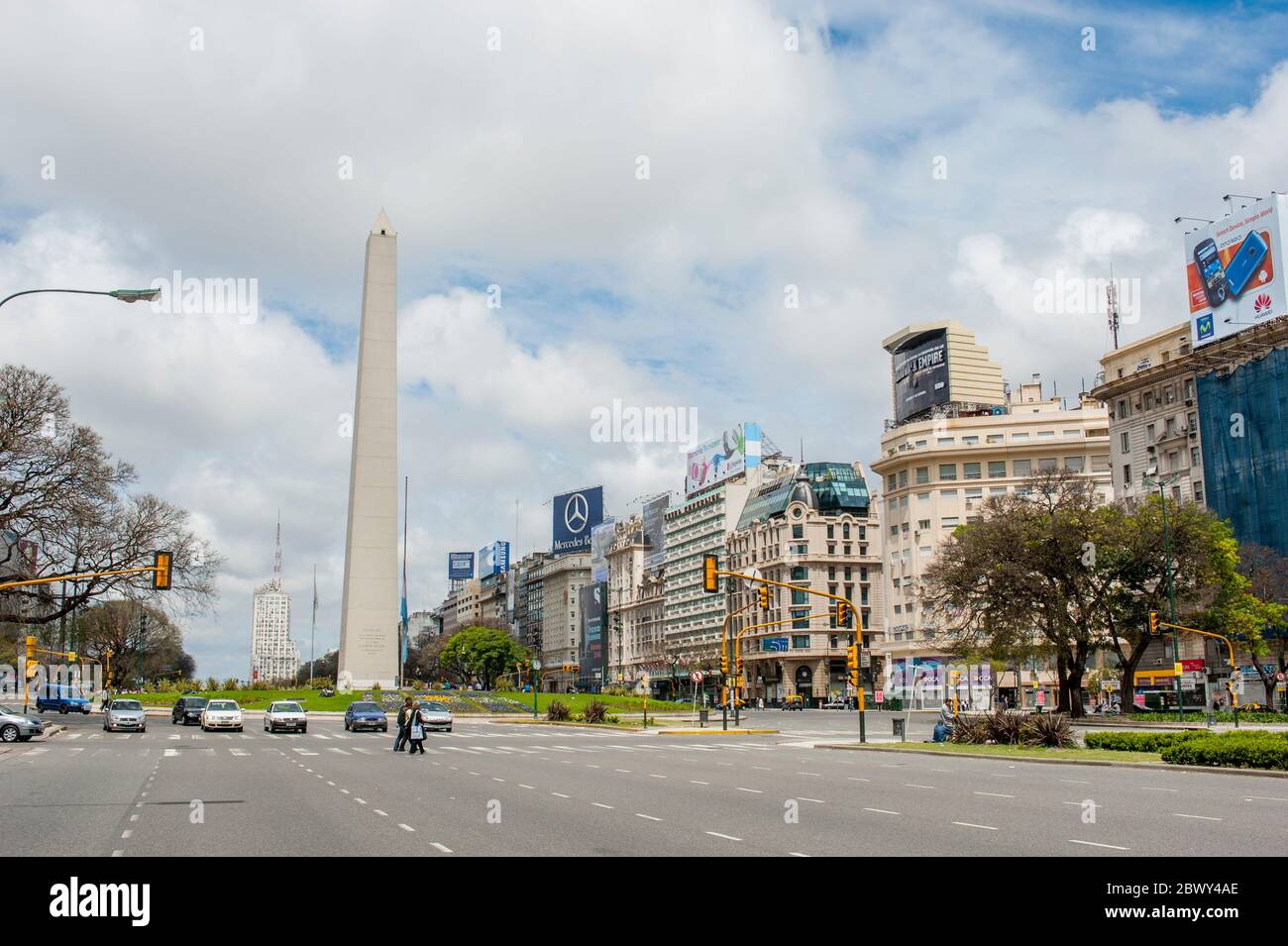 The Avenida 9 De Julio With The Obelisk In Downtown Buenos Aires the-avenida-9-de-julio-with-the-obelisk-in-downtown-buenos-aires