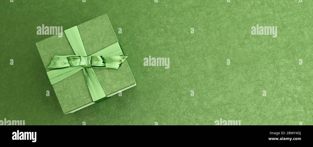 Mock-up poster, emerald green luxury gift box with shiny bow on shamrock green background, 3D Render, 3D Illustration Stock Photo