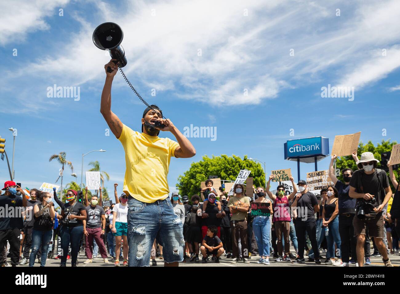 Activist with bullhorn at Black Lives Matter protest over the killing of George Floyd: Fairfax District, Los Angeles, CA, USA - May 30, 2020 Stock Photo