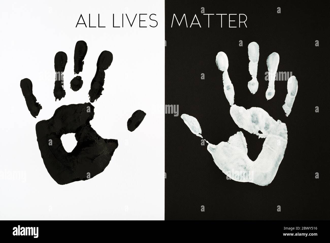 Black and white palm prints background inscription All Lives Matter. Equal Symbol. No racism concept. Stock Photo