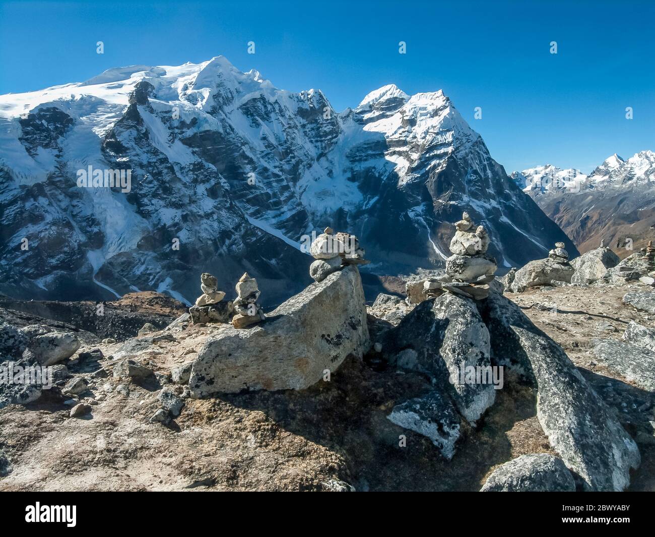 Nepal. Trek to Mera Peak. Looking down and across the Hinku valley towards the Yak settlement of Khare and massive bulk of Mera Peak Stock Photo