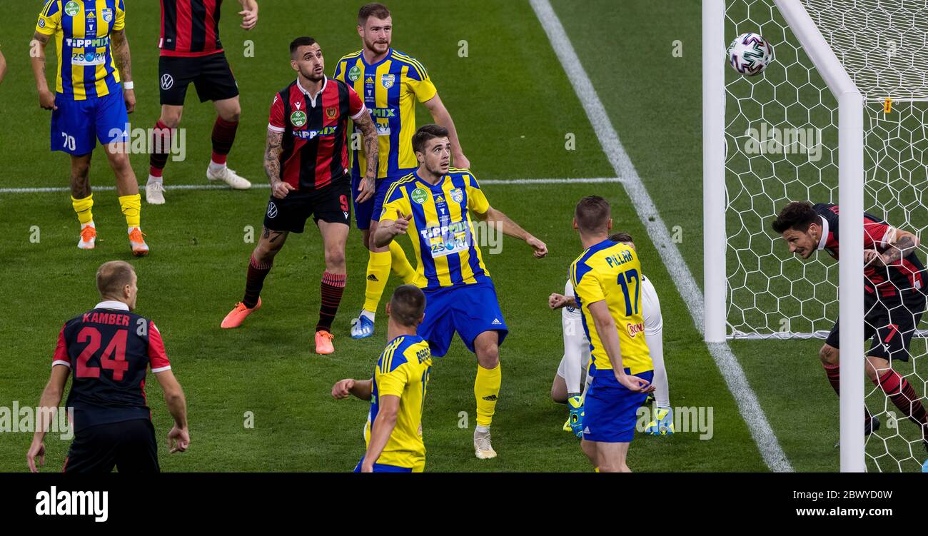 BUDAPEST, HUNGARY - JUNE 3: -(l-r) Djordje Kamber of Budapest Honved #24 scores during the Hungarian Cup Final match between Budapest Honved and Mezokovesd Zsory FC at Puskas Arena on June 3, 2020 in Budapest, Hungary. Stock Photo