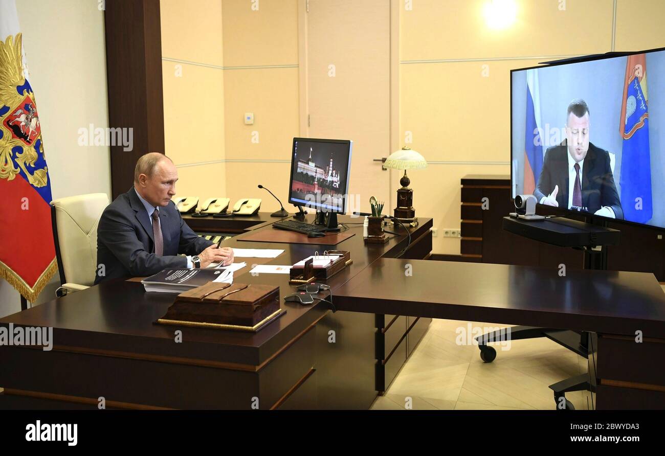 Novo-Ogaryovo, Russia. 03rd June, 2020. Russian President Vladimir Putin, chairs a meeting via video conference with Tambov Region Governor Alexander Nikitin from his office at the Novo-Ogaryovo state residence June 3, 2020 outside Moscow, Russia. Credit: Aleksey Nikolskyi/Kremlin Pool/Alamy Live News Stock Photo