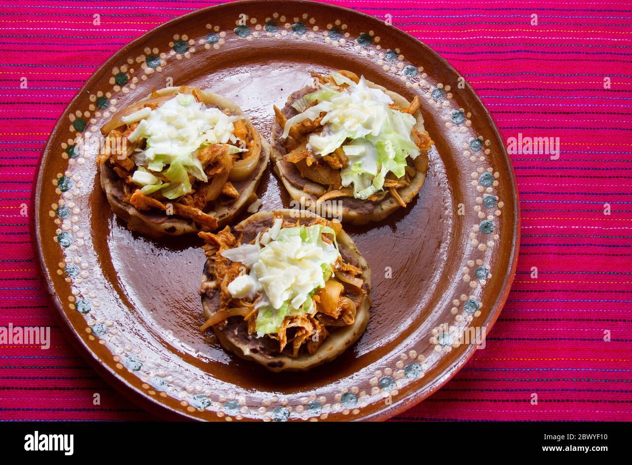Traditional mexican sopes tinga Stock Photo Alamy