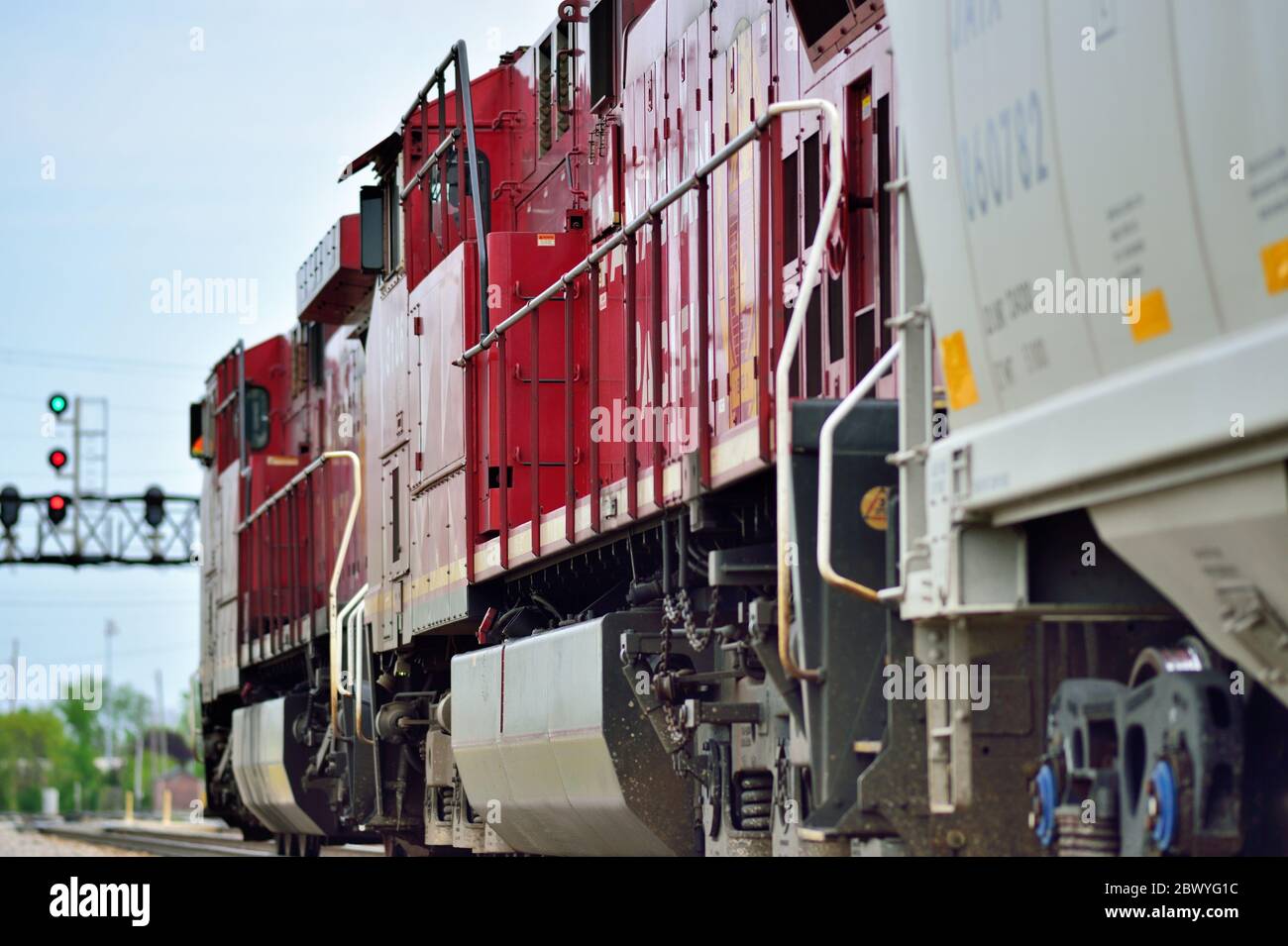 Franklin Park, Illinois, USA. A pair of Canadian Pacific Railway locomotives edge a manifest or mixed freight train out of the railroad's yard. Stock Photo