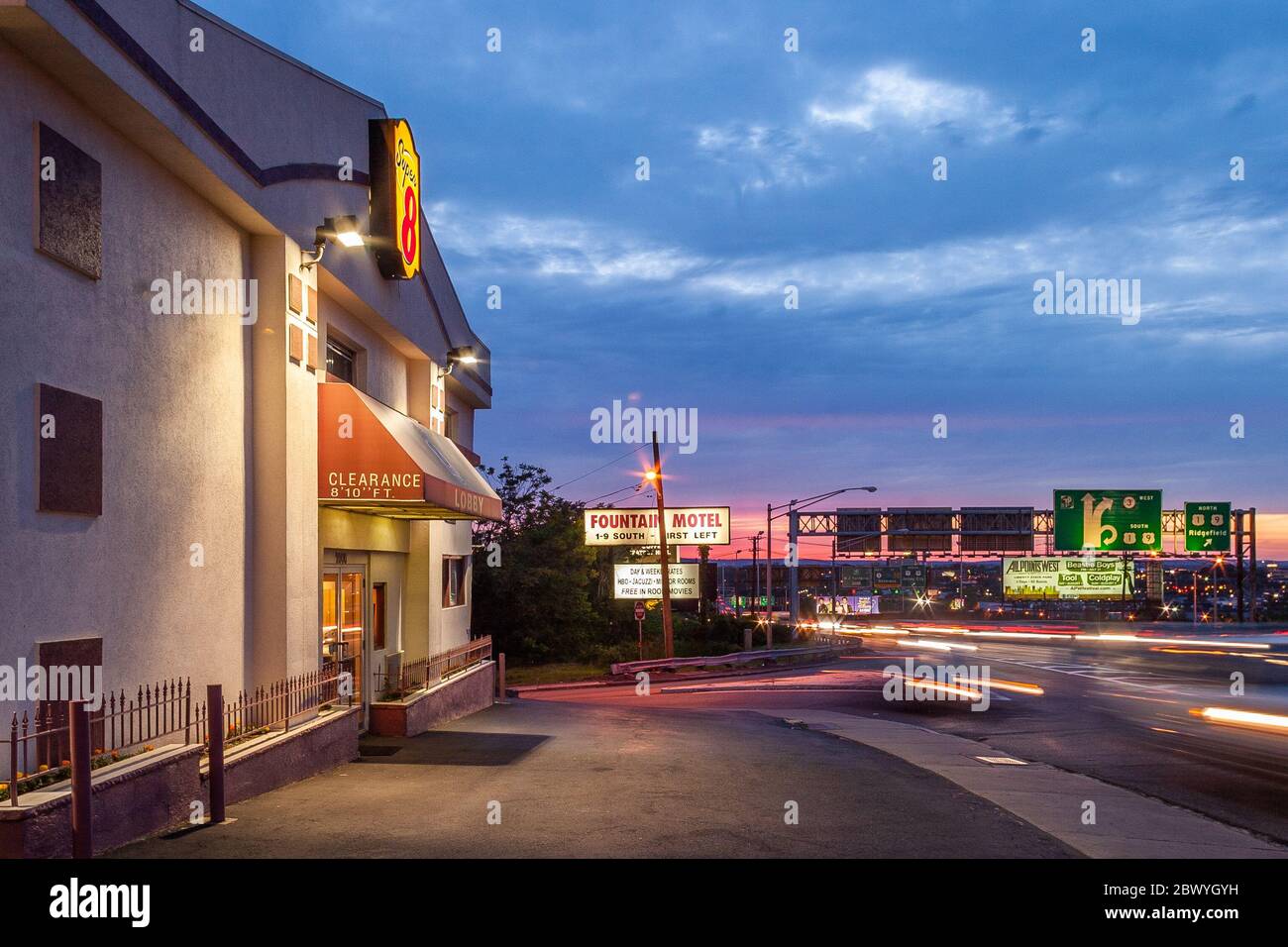 Motels along New Jersey Route 495 at dusk Stock Photo