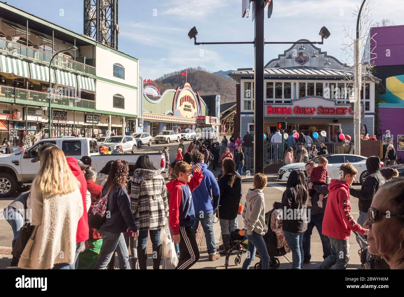 Visitors crowd Parkway, the main street, during high season in winter