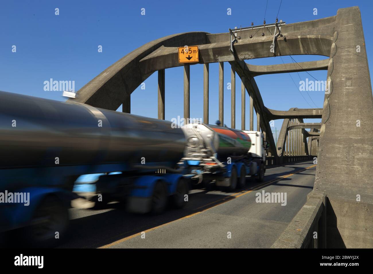 Milk tanker on Balclutha Bridge, South Otago, New Zealand Stock Photo