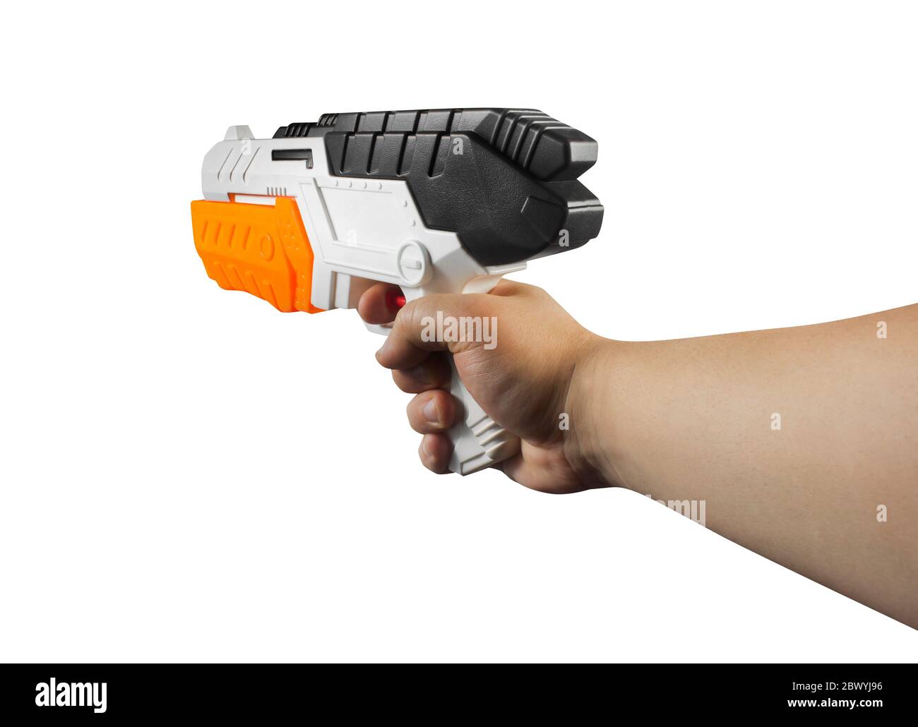 Isolated photo of hand holding a plastic water pistol on white background first person view. Stock Photo