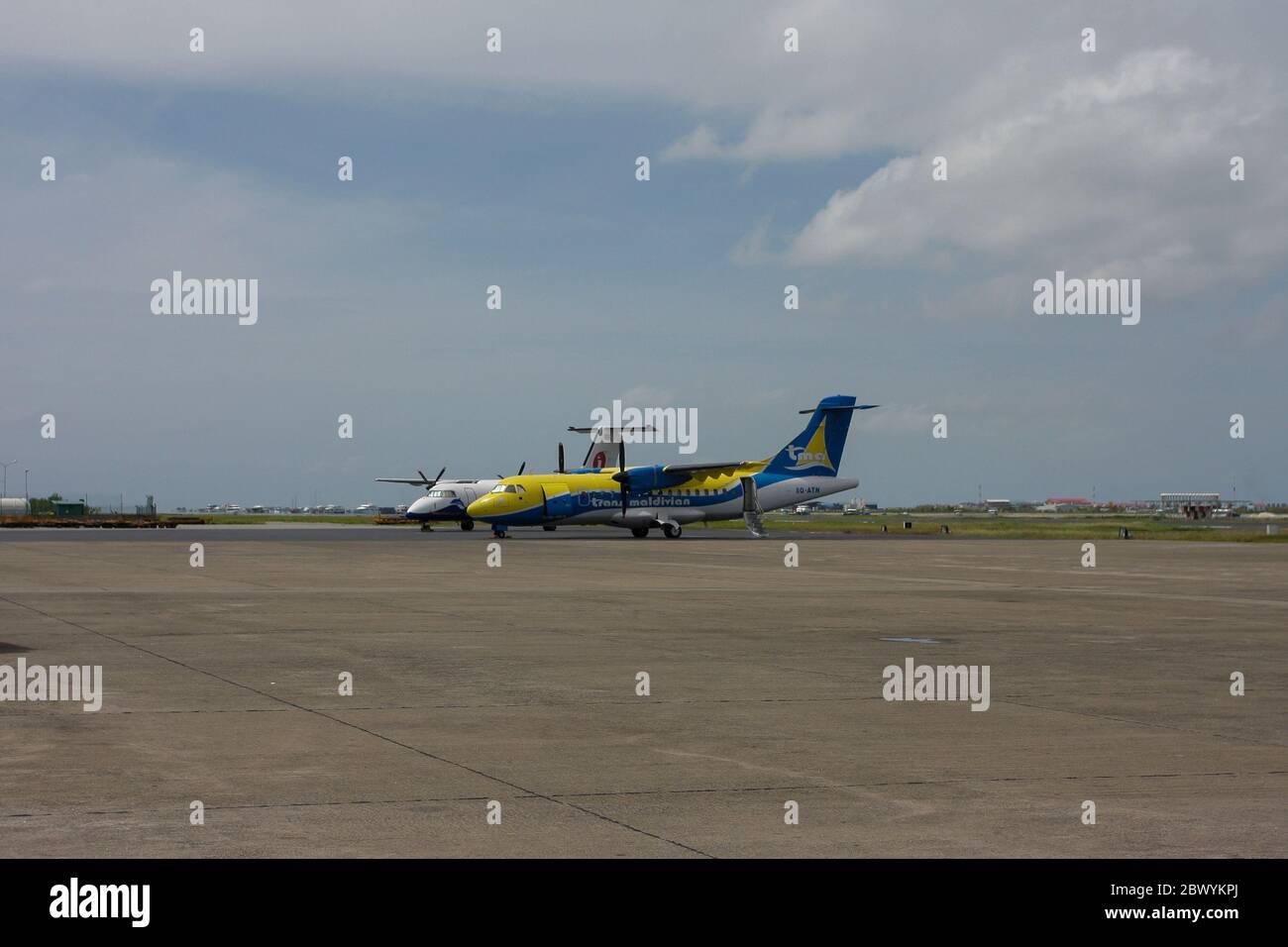 Aircraft of Trans Maldivian Airlines on the Male International Airport, Maldives. Stock Photo
