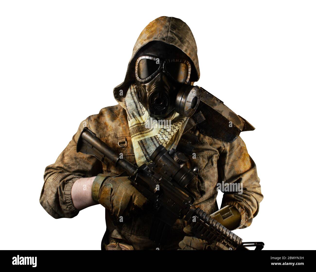 Isolated photo of a desert post-apocalyptic soldier in tactical jacket, gas mask, gloves, rifle and armor on white background front view. Stock Photo