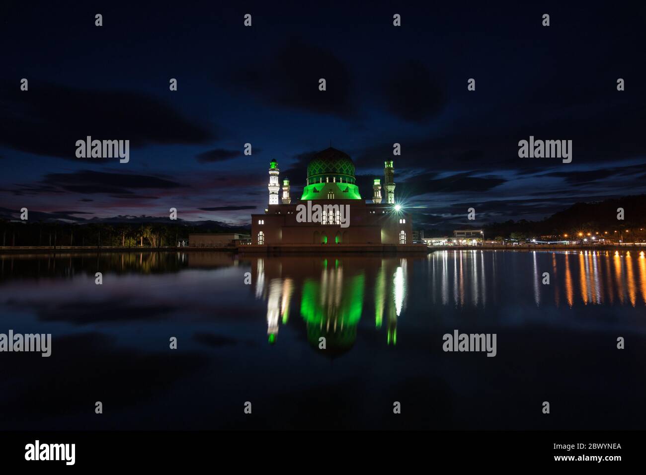 Majestic Beautiful sunrise blue hour and reflection of Floating Mosque Of Kota Kinabalu, Sabah. A mosque is a place of worship for followers of Islam. Stock Photo
