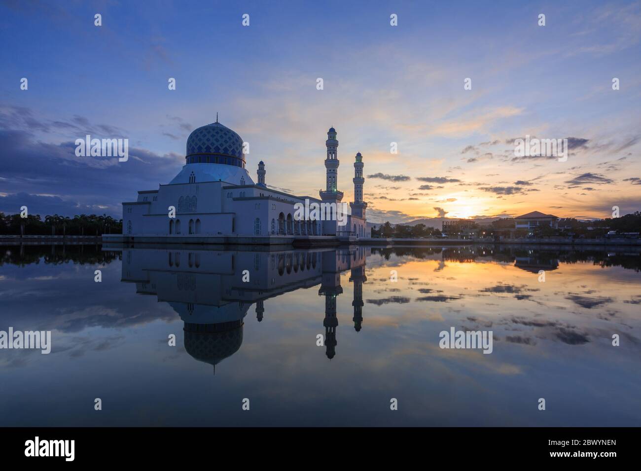 Majestic Beautiful sunrise blue hour and reflection of Floating Mosque Of Kota Kinabalu, Sabah. A mosque is a place of worship for followers of Islam. Stock Photo