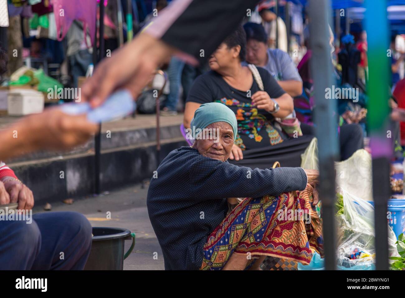 Tuaran, Sabah, Malaysia-January 21,2018: Local Young Malaysian Muslim lady selling drink at the weekly market at Tuaran, Sabah, Malaysia Stock Photo