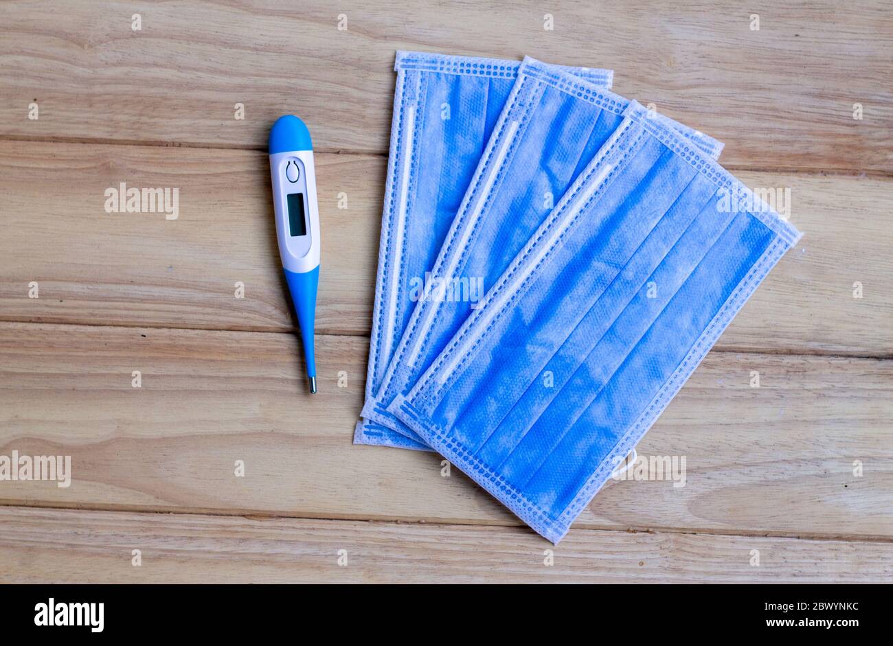 Digital thermometer on blue background hi-res stock photography and ...