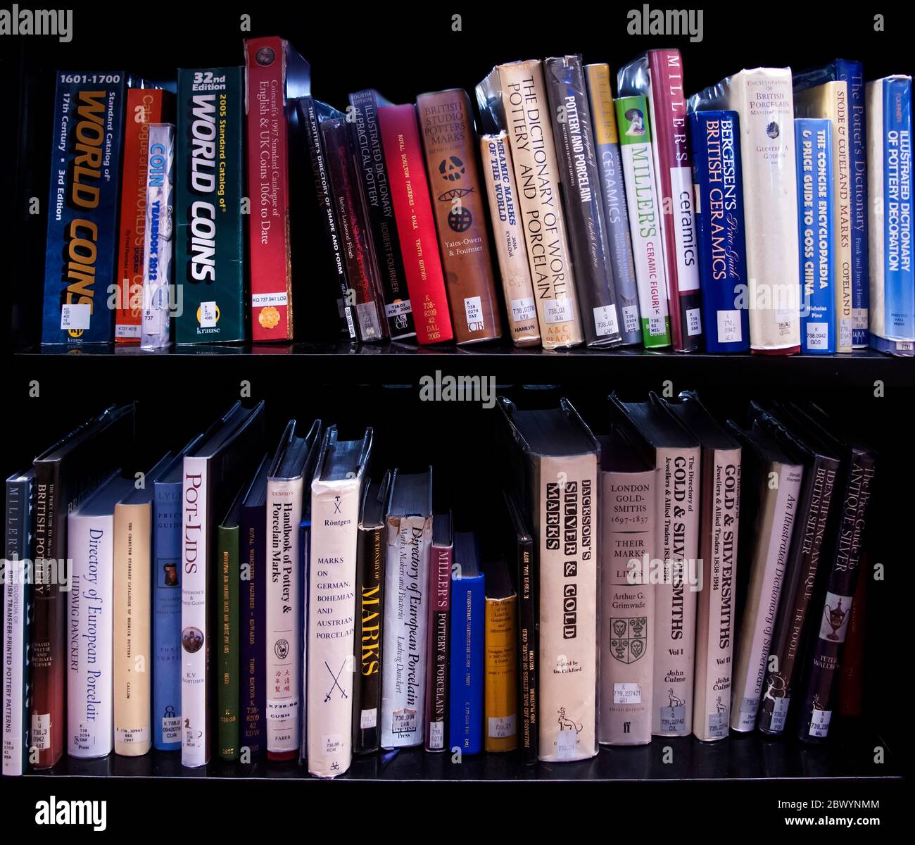 Library books on shelves Stock Photo