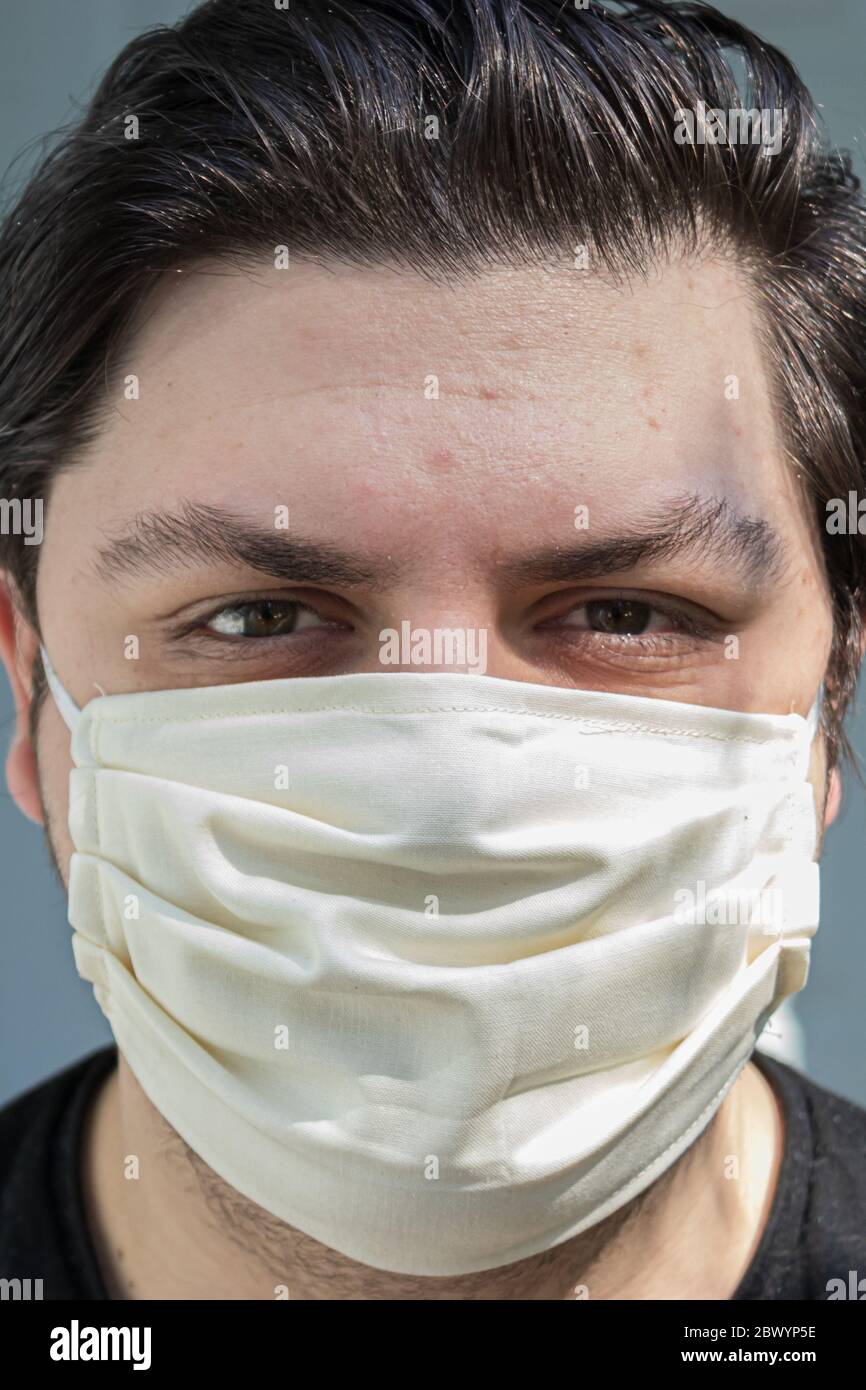 Man face in protective medical hi-res stock photography and images - Alamy