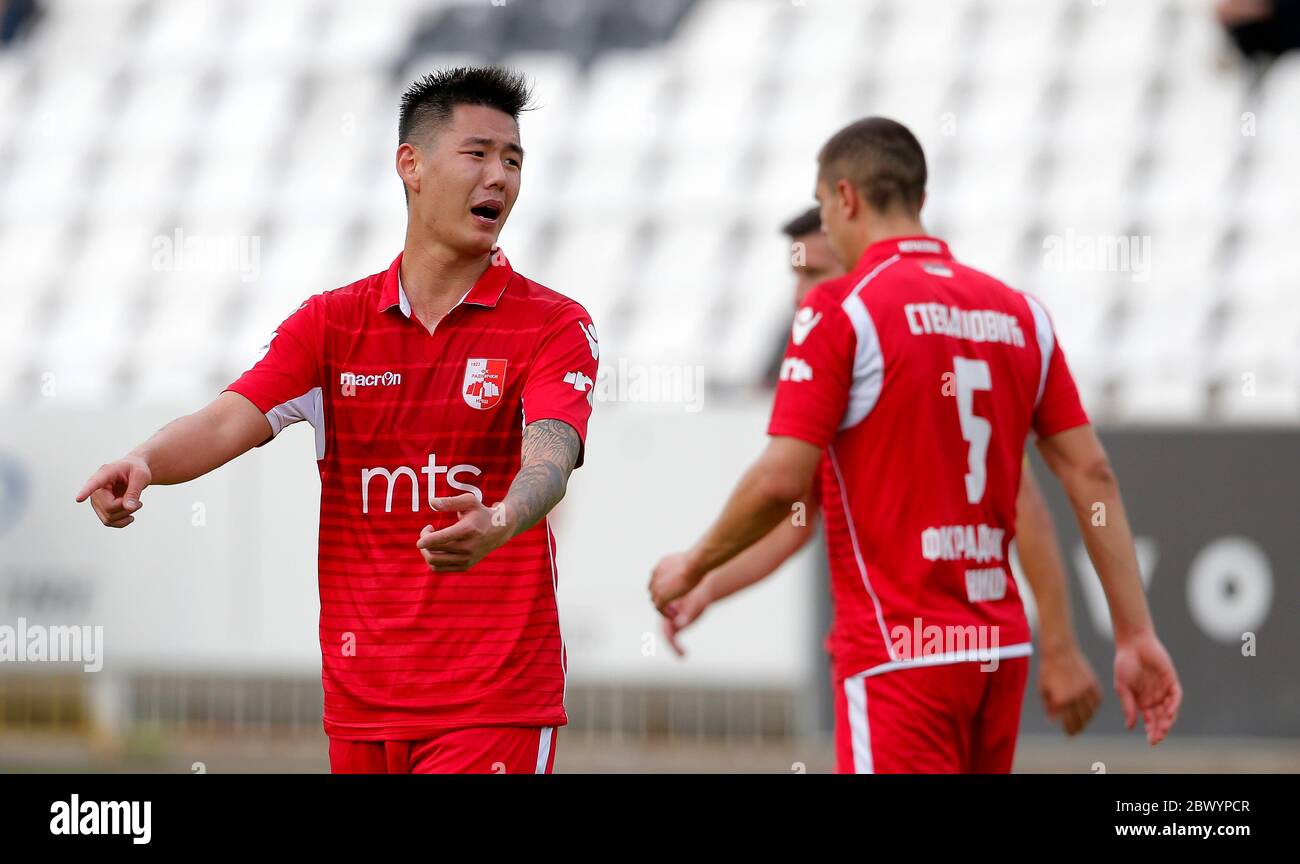 Belgrade. 3rd June, 2020. Hao Runze of Radnicki Nic (L) passes the