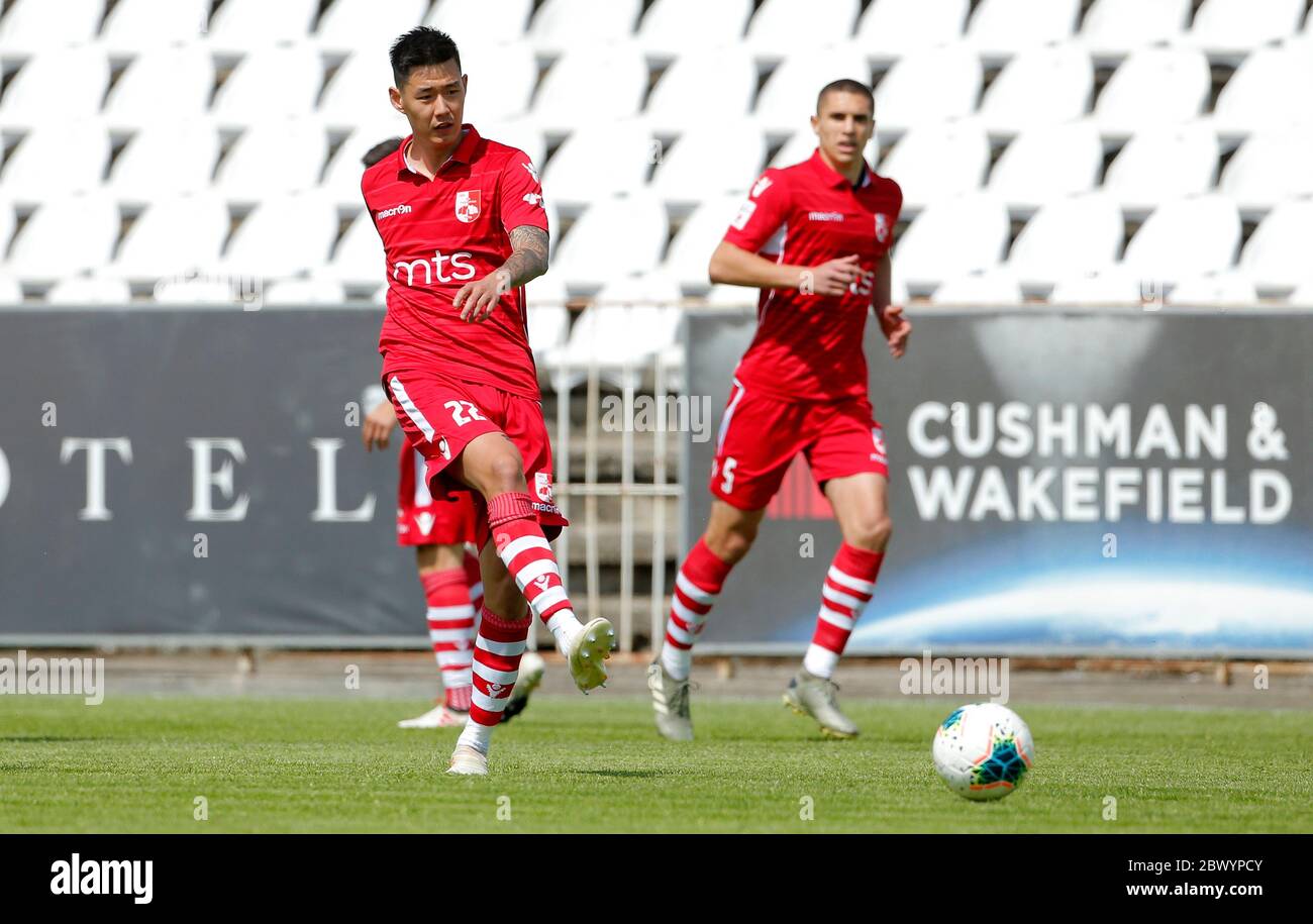 Belgrade. 3rd June, 2020. Hao Runze of Radnicki Nic (L) passes the