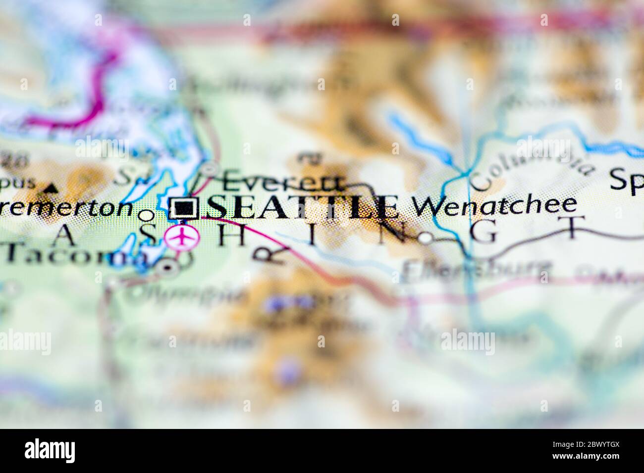Shallow depth of field focus on geographical map location of Seattle
