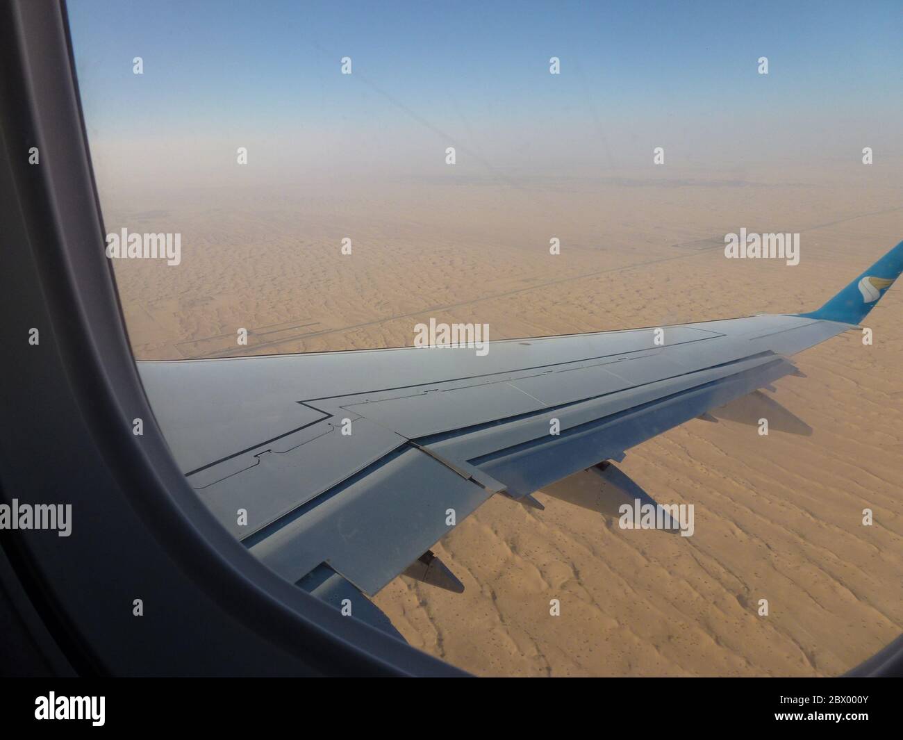 A beautiful view from the top. Flying over Oman and heading towards Dubai. Stock Photo