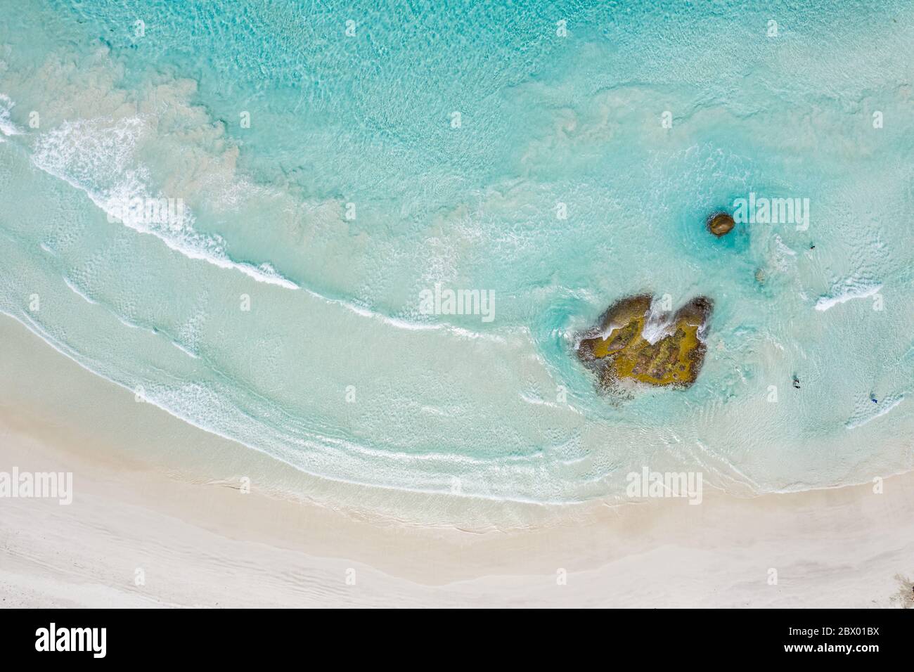 Overhead view of rocks with swimmers on the beach at Twilight Cove in ...