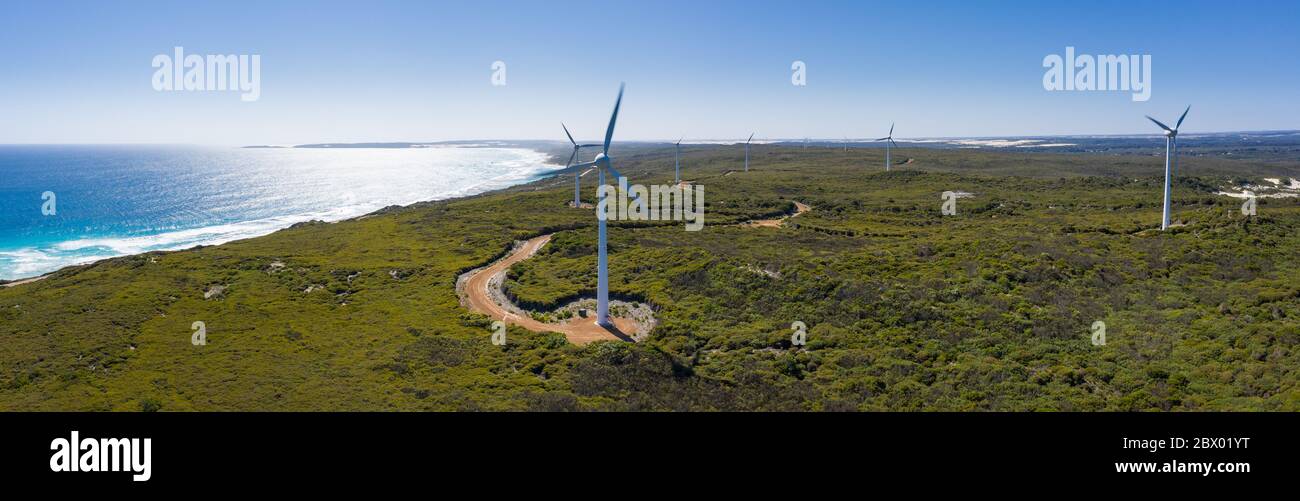 Aerial panoramic view of the wind turbines looking towards the ocean on the coast at Esperance Wind Farm in Western Australia Stock Photo
