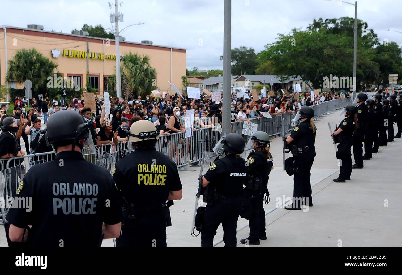 June 3, 2020 - Orlando, Florida, United States - Protesters  shout slogans at police officers during  a demonstration against police brutality and the killing of George Floyd in front of Orlando Police Headquarters on June 3, 2020 in Orlando, Florida. Protests continue to be held across  the country over the death of George Floyd, who was killed on May 25 while being arrested in Minneapolis. (Paul Hennessy/Alamy Live News) Stock Photo