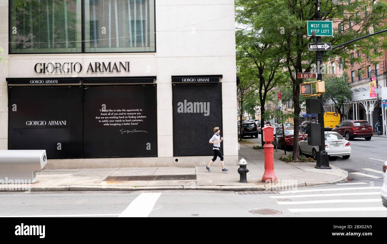 Stores on New Yorks Madison Avenue, home of many fashion brands like Giorgio  Armani are seen boarded up to prevent another night of possible  destruction, looting and violence in the wake of