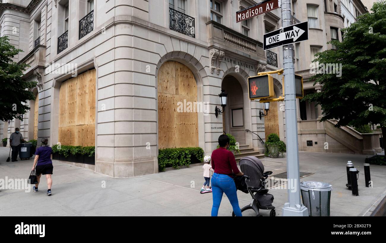 Stores on New Yorks Madison Avenue, home of many fashion brands like Ralph  Lauren are seen boarded up to prevent another night of possible  destruction, looting and violence in the wake of