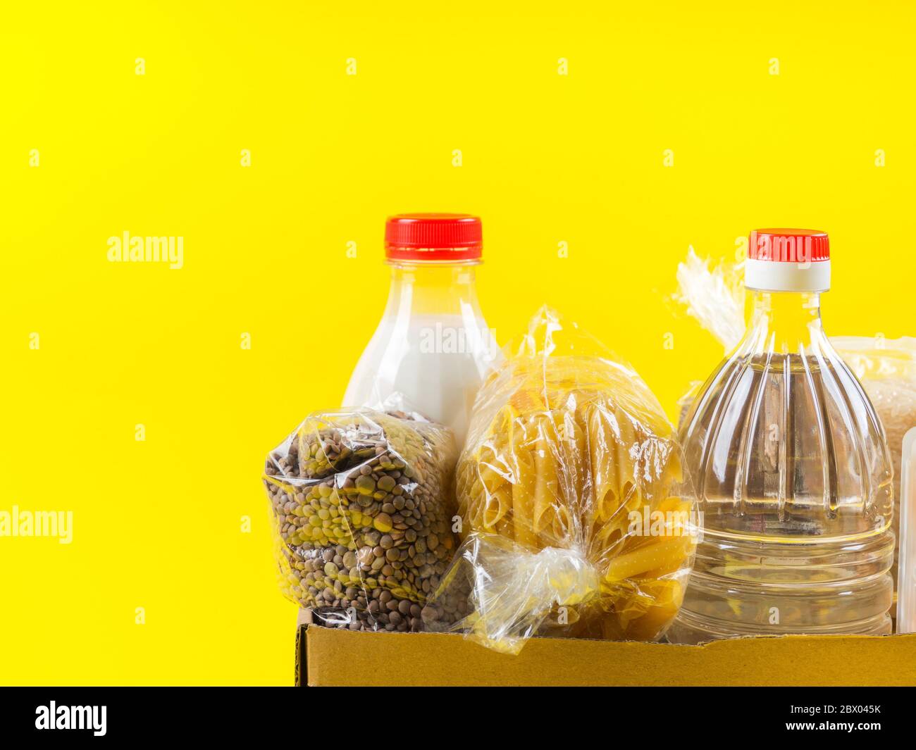 Food staples delivery or donation box concept Stock Photo Alamy