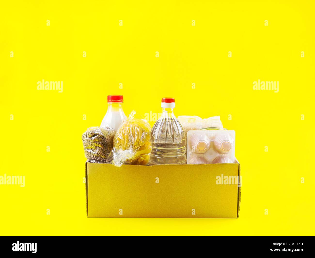 Food staples delivery or donation box concept Stock Photo Alamy